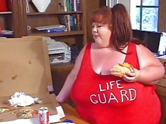 Fat lifeguard bitches eat food on the beach