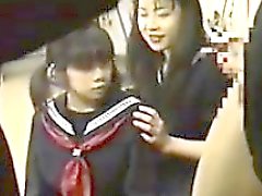 Four Japanese Schoolgirls Playing With A Cock