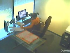 Masturbating in office on security camera