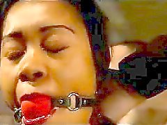 Black Girl With Mouth Gag Tied Arms Nipple Clips Getting Her Pussy Stimulated With Vibrator By The Master In The Dungeon