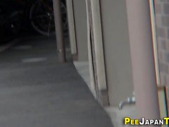 Asian watched urinating