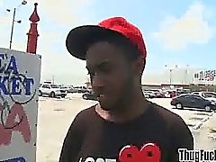 Black thug sucks a big hairy cock outdoors