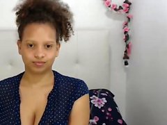 Spanish Mulatta teases until showing huge tits and areolas