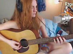 cute skinny tgirl play guitar for her fans