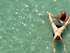 horny stepmom in the sea and on the beach