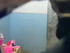 Asian aunt spied in bathroom (big tits)