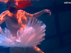 Bulava Lozhkova with a red tie and skirt underwater