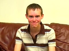 Skinny British twink cums after masturbating his fat dick