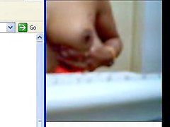 Mature masturbates on webcam