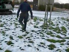 great guy in waders, rubber boots, mud and overall