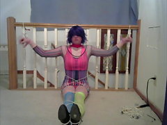 CD Lisa in multiple bondage position (rave outfit)s