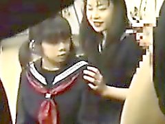 Four Japanese Schoolgirls Playing With A Cock