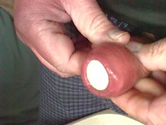 Foreskin with casino chip and table tennis ball - and piss