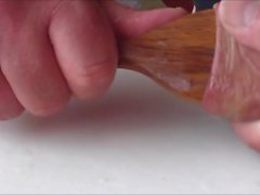 Large wooden spoon stretches foreskin - 5 more videos