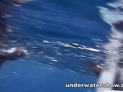 Three girls swimming nude in the sea