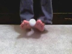 Long toes playing with a ball